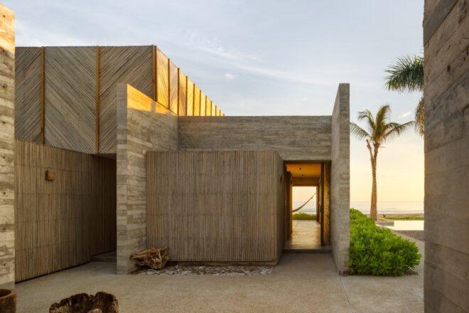 Exterior walls of the home made up of wood and other natural materials.