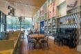 small round cafe tables in a colorful restaurant