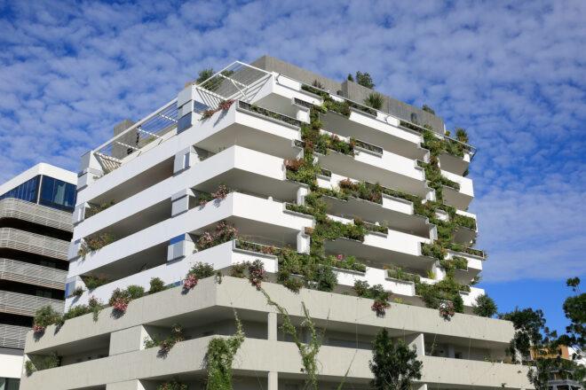 plants on a tall white building