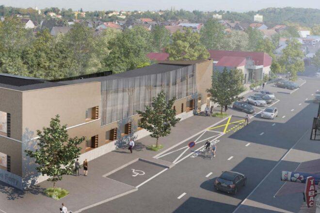 aerial rendering of large, solar-powered school building