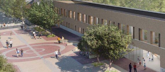 aerial rendering of large school building and courtyard