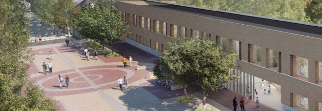 aerial rendering of large school building and courtyard