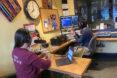 volunteers working at a radio station