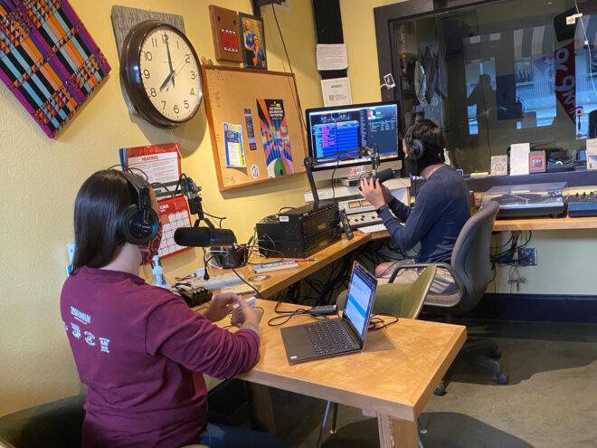 volunteers working at a radio station