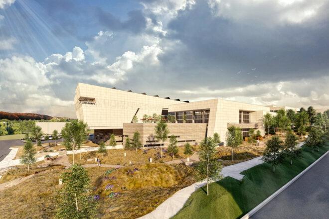 rendering of large tan building surrounded by plants and greenery
