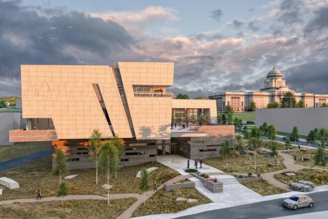 rendering of large tan building at sunset