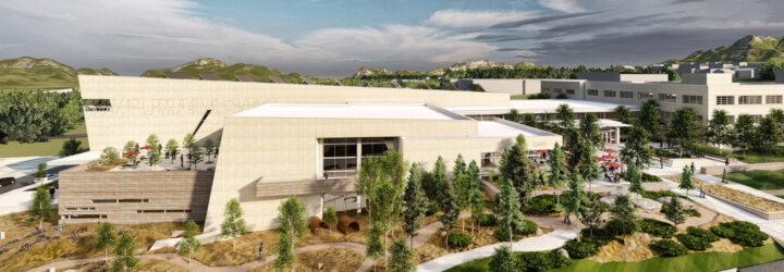 aerial rendering of large tan building with solar panels
