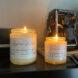 two candles on fireplace mantel