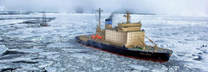 a ship sailing through icy water