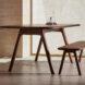 dark wood dining table with long dark wood bench