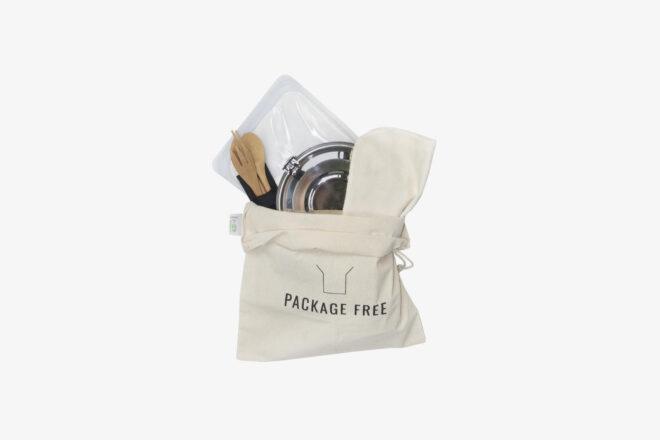reusable bag, metal container, bamboo utensils in cloth bag