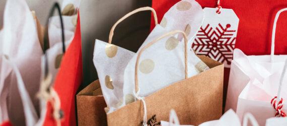 holiday gift bags stuffed with tissue paper