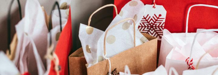 holiday gift bags stuffed with tissue paper