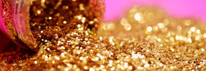 gold glitter spilling from container