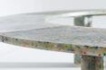 A close-up of the edge of a plastic Circula bench.