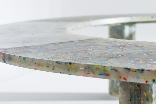A close-up of the edge of a plastic Circula bench.