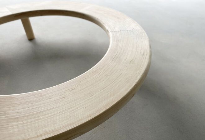 One half of the wood Circula bench.