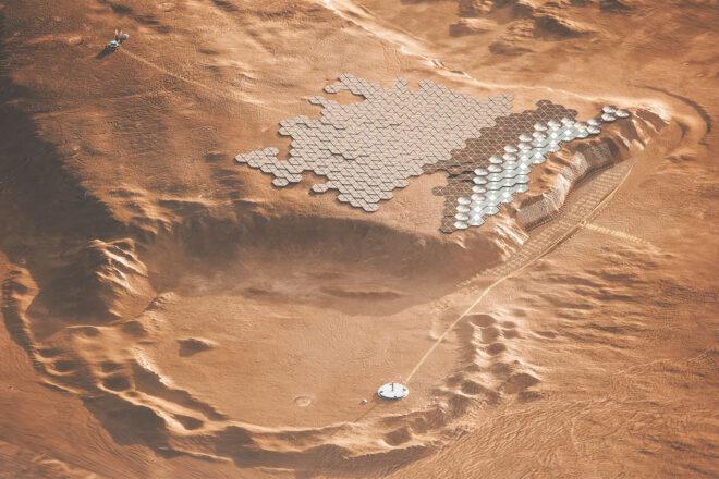 A bird's-eye view of a crater surrounded on one side by solar panel-like structures.