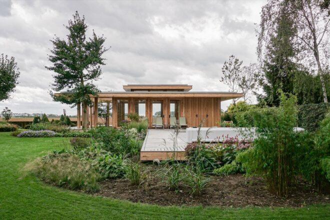 long timber building with glass walls