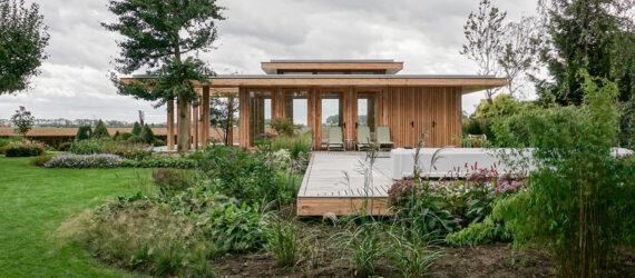 long timber building with glass walls