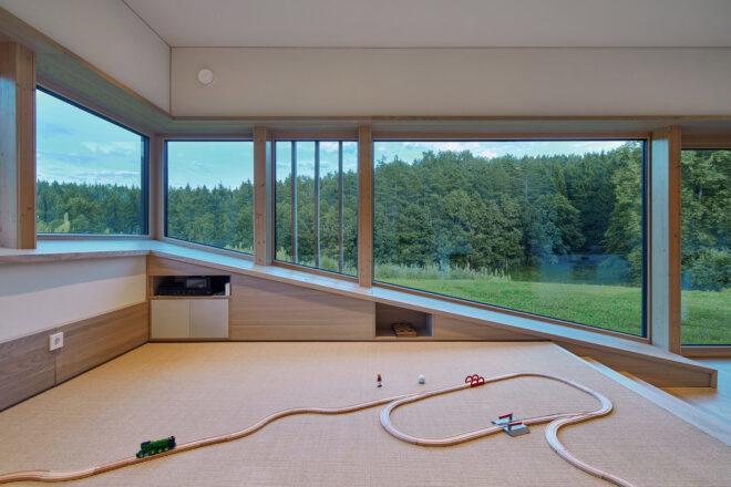 child's wood racetrack on living room floor