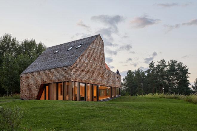 home clad in glass and cedar