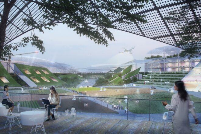 people on elevated patio overlooking farmland