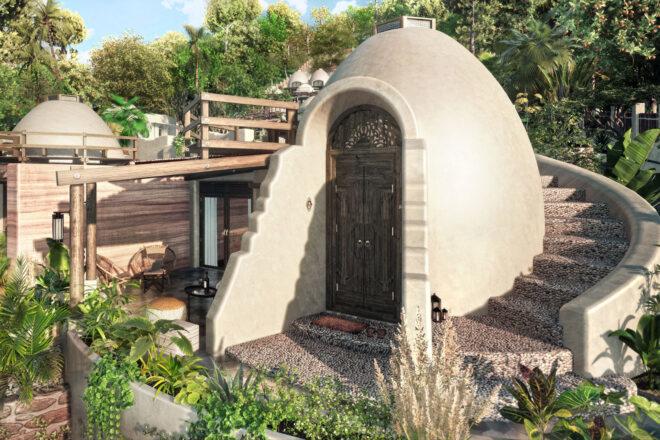dome home with spiral stairs around the back