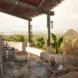 wicker chairs on covered patio