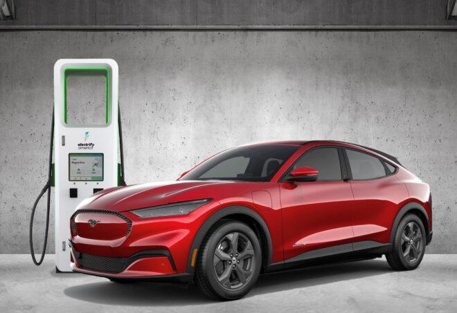 Ford electric vehicle plugged into charging station