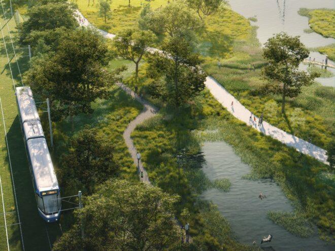 aerial rendering of metro driving on the edge of a park with a lake
