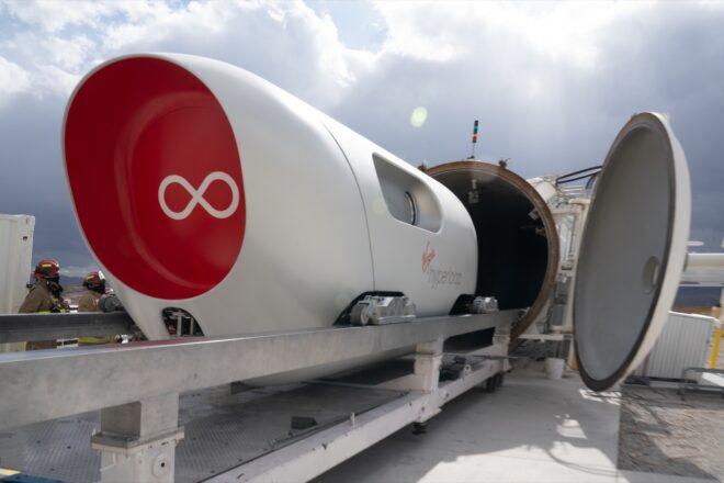 white and red Hyperloop pod