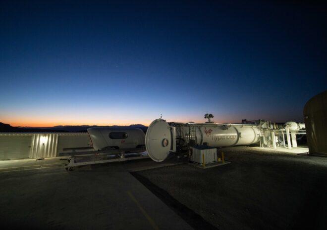 white Hyperloop pod at sunset