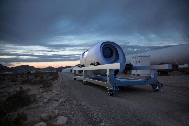 white transit pod at sunset