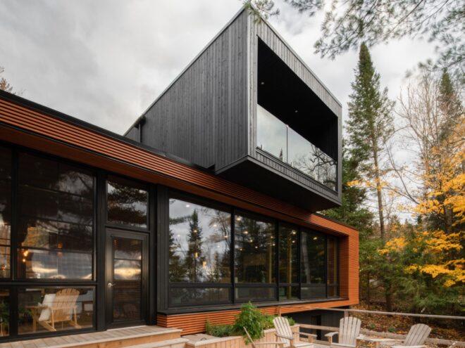 black and wood home with full-height glazing