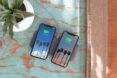 two phones charging on one wireless charger