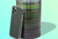 phone with clear case leaning against stack of CDs