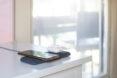 phone and Apple Airpods on wireless charger
