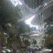 rendering of tall structures among trees