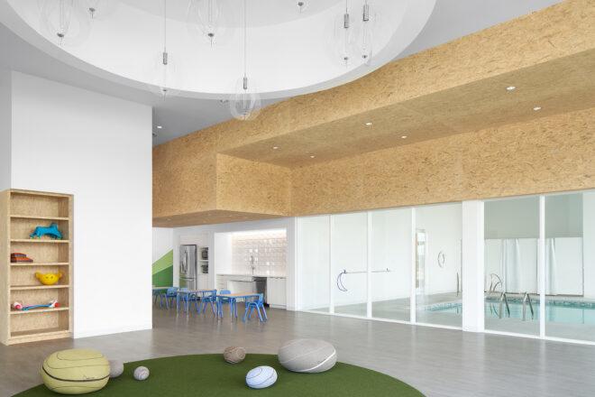 green turf and rock-shaped seats in a classroom
