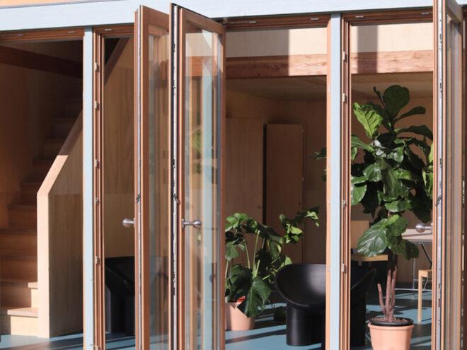 timber-framed glass doors on a building