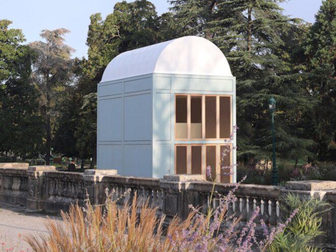 large white timber building with domed roof