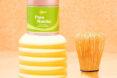 A matcha tea kit with a bamboo whisk.