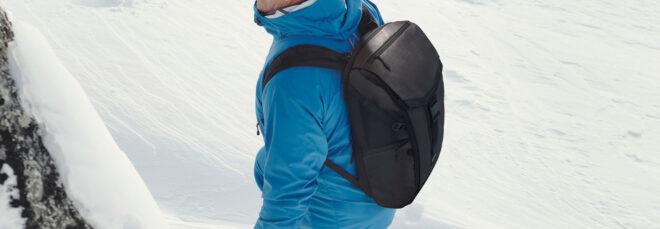 Explorer Robert Swan wearing backpack in the Arctic