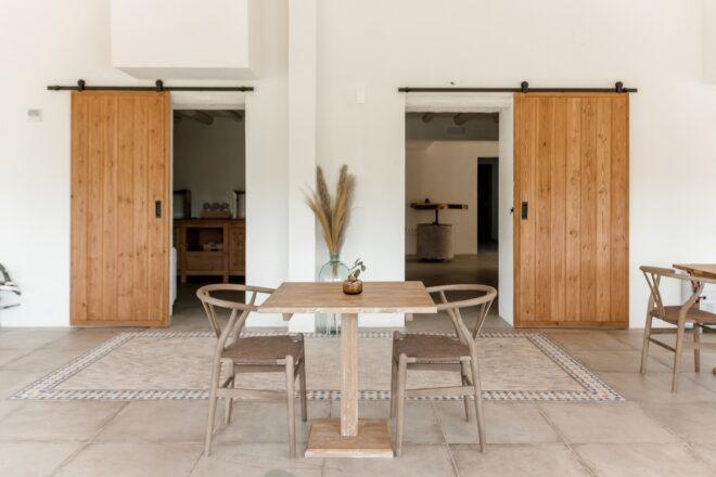 small wood table with gray chairs