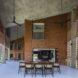 large dining table near brick wall
