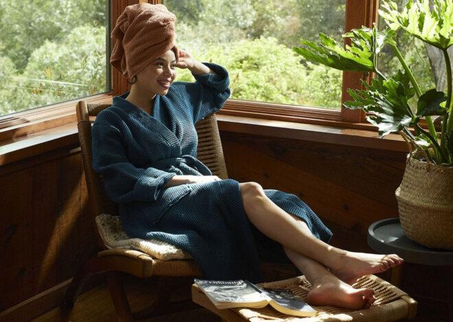 A person lounging in a blue robe.