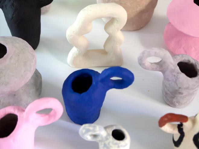 blue, tan and pink sculptural vases