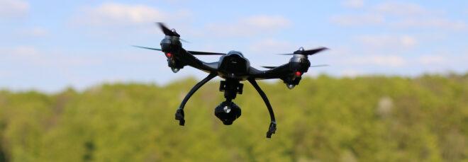 drone flying over a forest