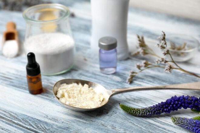 natural deodorant ingredients on wood table